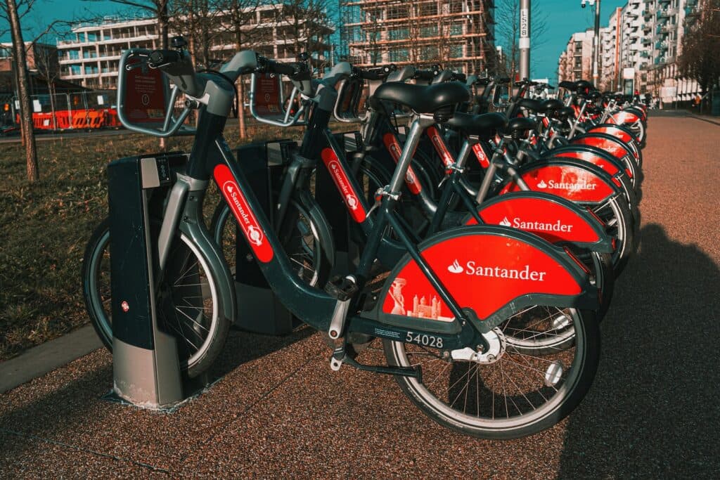 black and red bicycle on brown concrete floor