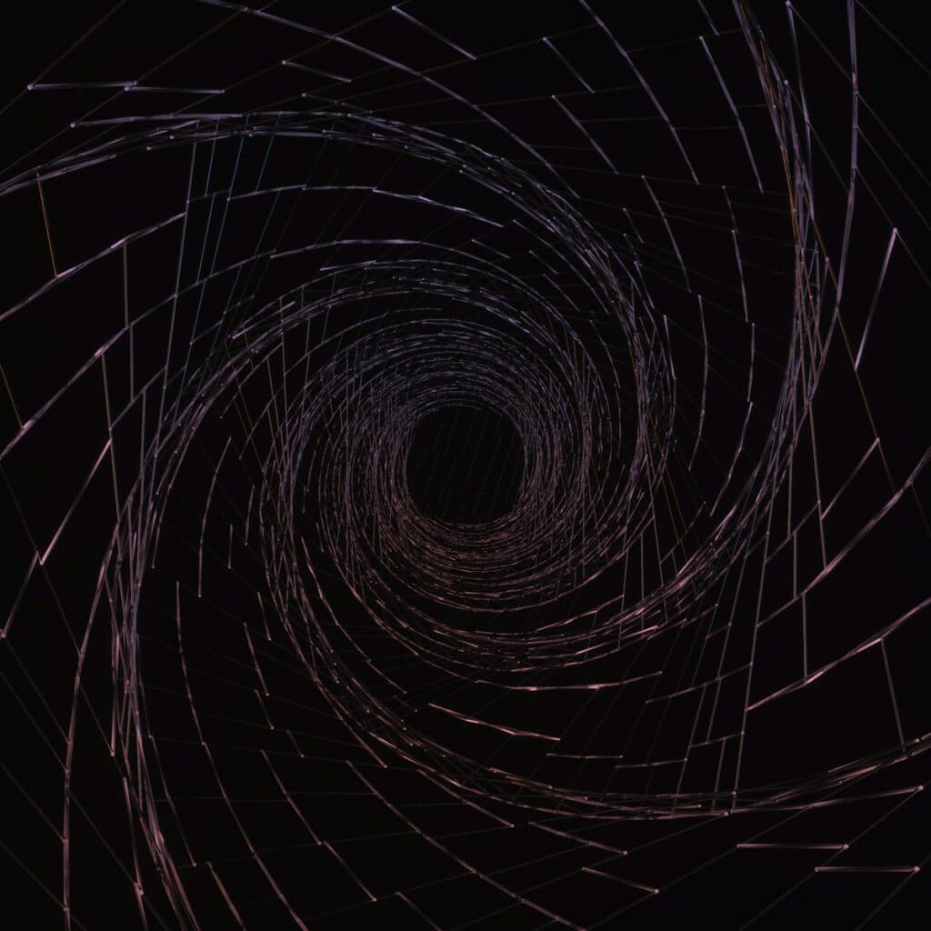 a dark tunnel with a black background