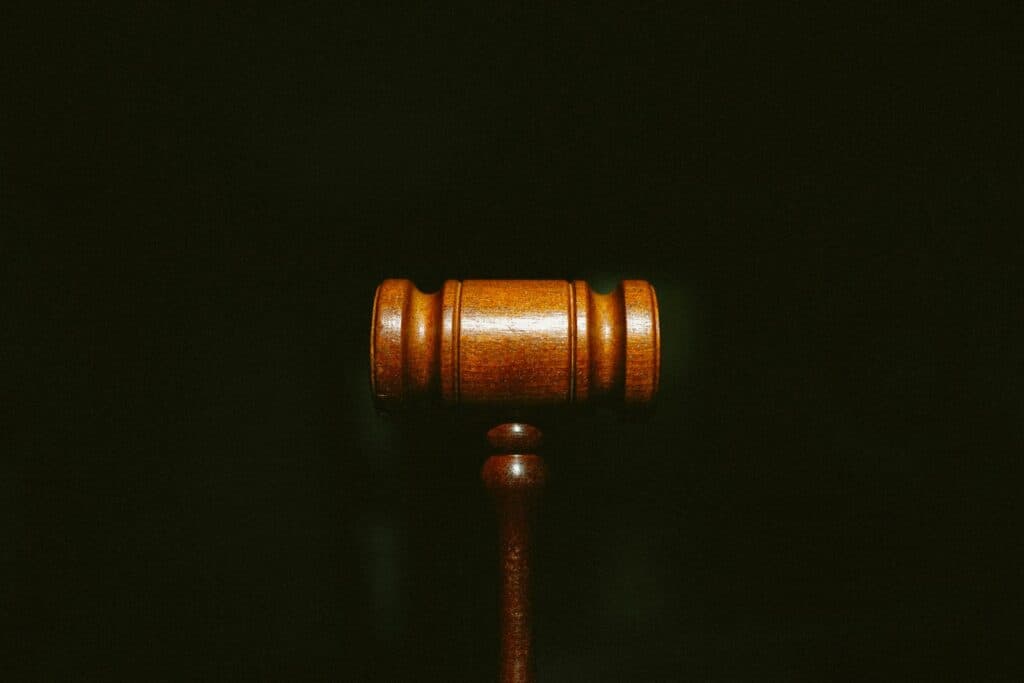 brown wooden stand with black background